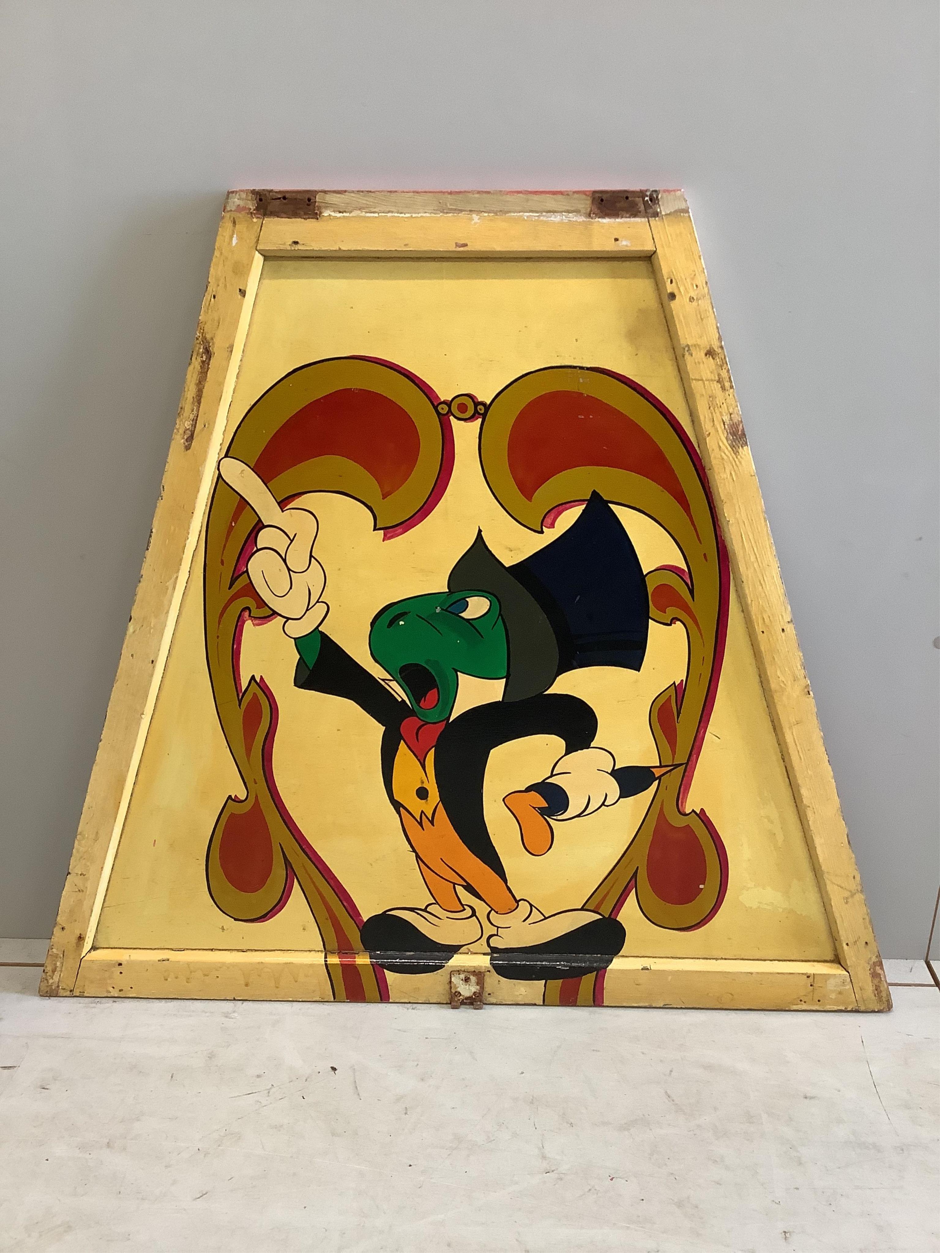 A mid century “Jiminy Cricket” painted wood fairground carousel panel of tapered rectangular form, width 104cm, height 94cm. Condition - fair